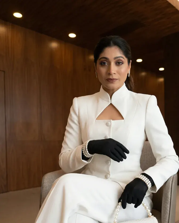 Bandita Patro in a white structured jacket