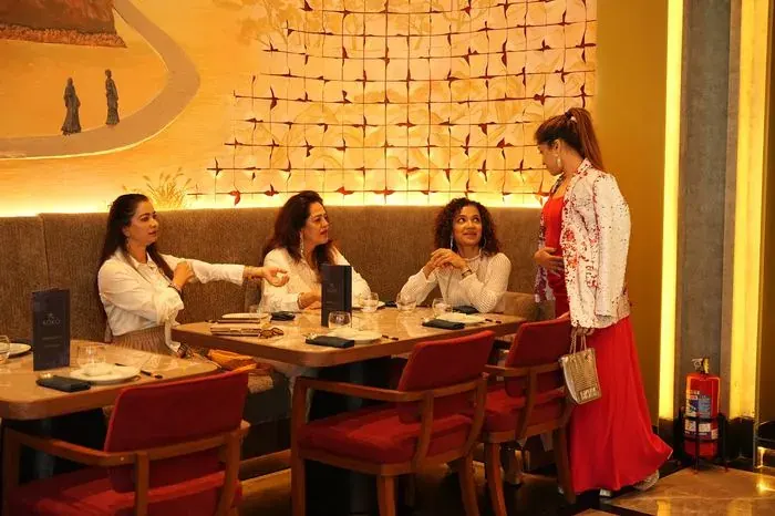 Members greeting each other.