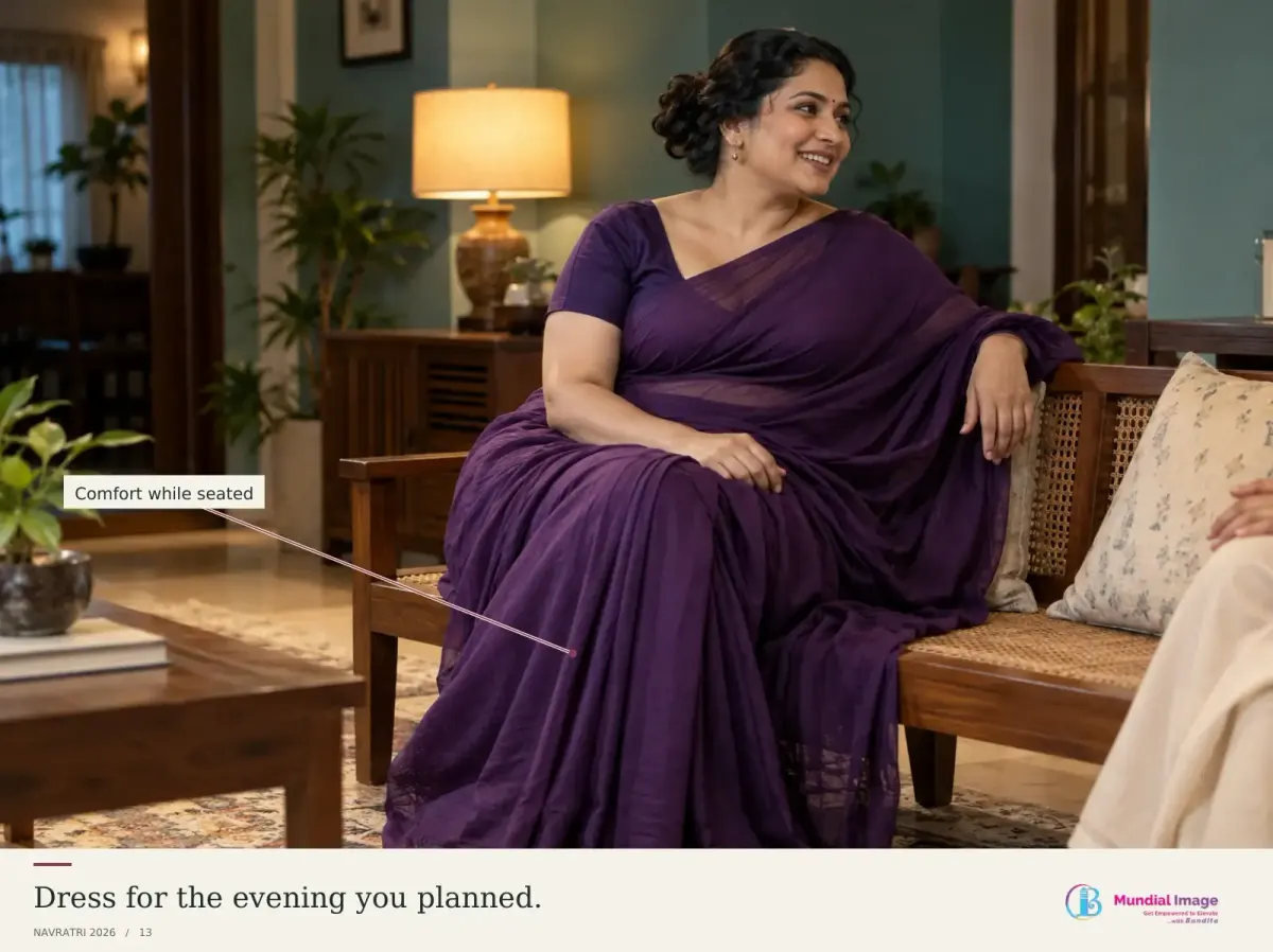 Indian woman in a purple saree at a relaxed family evening.